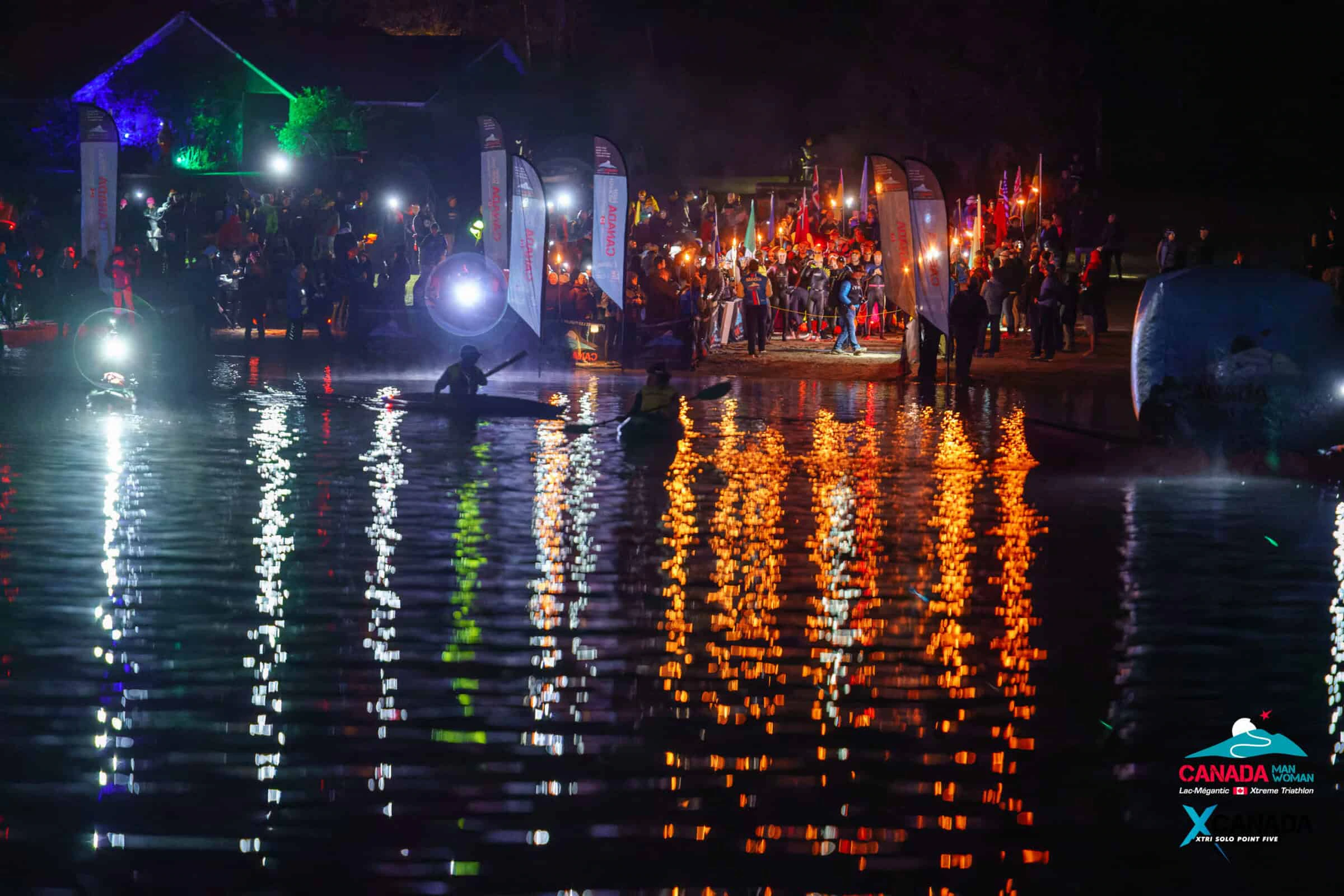 Night start of Canada Man XTRI World Tour Extreme Triathlon at Lac-Mégantic